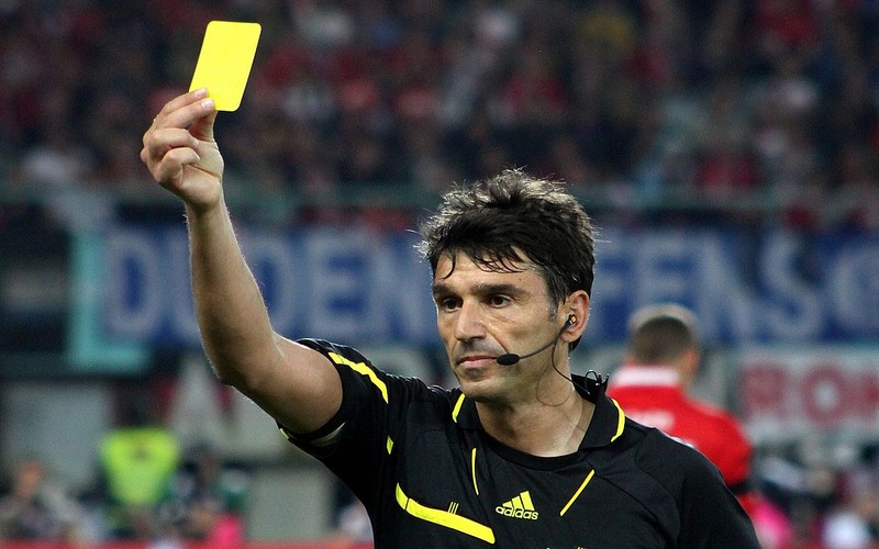 Referee Gives Yellow Card